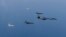 Бомбардувальник ВМС США B-1B Lancer і південнокорейські винищувачі F-15K