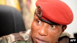 Photo of Guinea's ex-dictator, Captain Moussa Dadis Camara, speaking as then junta chief in Conakry on September 30, 2009.