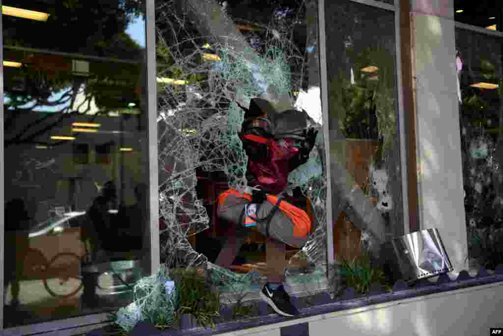 Protesters loot shops in Santa Monica, California, May 31, 2020, during a demonstration over the death of George Floyd in Minneapolis police custody.