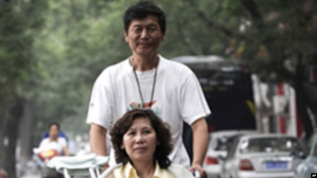 中國殘疾人律師倪玉蘭與丈夫董繼勤(資料圖片)