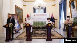 Menhan RI Prabowo Subianto (kanan), Menlu RI Retno Marsudi, Menlu Australia Marise Payne, dan Menhan Australia Peter Dutton dalam konferensi pers seusai pertemuan di Kemenlu RI di Jakarta, 9 September 2021. (Kemenlu RI/Handout via REUTERS)