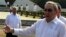 Cuba's President Raul Castro talks to the media after a wreath-laying ceremony at the Soviet Soldier monument in Havana, February 22, 2013. 