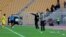 آمبولانس حاضر در ورزشگاه محل مسابقه پرسپولیس و نفت تهران در تصویر مشخص است