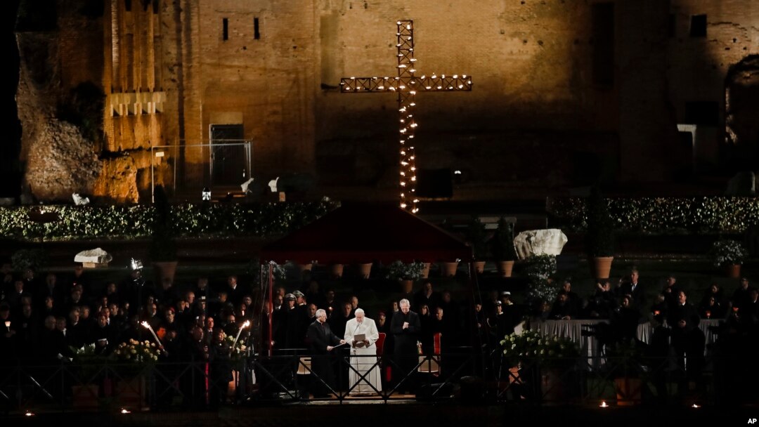 Pope Francis recites his prayer at the end of the Via Crucis (Way of the Cross) torchlight procession in front of the Colosseum on Good Friday, a Christian holiday commemorating the crucifixion of Jesus Christ and his death in Rome, Italy, March 30, 2018.