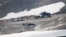 Accident investigators and rescue personnel work at the wreckage of a Junkers JU52 aircraft in Flims, Aug. 5, 2018, after it crashed into Piz Segnas, a 3,000-meter (10,000-foot) peak in eastern Switzerland.