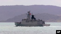 In this photo provided by the Australian Defense Force, the People's Liberation Army-Navy Jiangkai-class frigate Hengyang travels in the Torres Strait off Australia's coast, on Feb. 11, 2025.