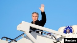 FILE - U.S. Secretary of State Antony Blinken boards a plane, en route to Saudi Arabia, as part of his fifth urgent trip to the Middle East since the war between Israel and Hamas in Gaza erupted in October, at Joint Base Andrews, in Maryland, U.S., February 4, 2024.