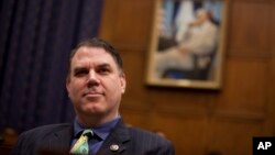 FILE - House Financial Services Committee member Rep. Alan Grayson, D-Fla., listens to Federal Reserve Chairman Ben Bernanke testify before the committee on Capitol Hill in Washington, Oct. 1, 2009. 