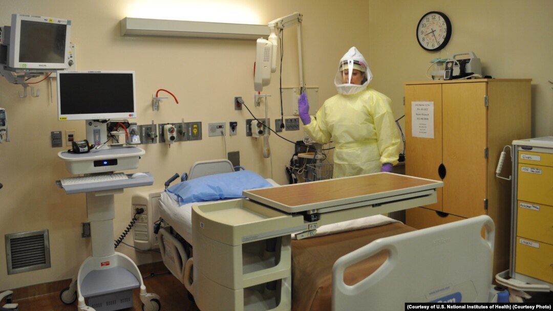 Workers must wear protective gear to care for patients with Ebola or other infectious disease in the NIH Clinical Center's high containment unit. (Photo courtesy of the U.S. National Institutes of Health)