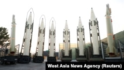 (FILE) Iranian ballistic missiles are displayed during the ceremony of joining the Armed Forces, in Tehran, Iran, August 22, 2023.