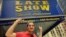Greg Contaldi, a lifetime Dave Letterman fan, outside the CBS Ed Sullivan Theater in Manhattan, hoping to get an audience ticket for the host's last show. (VOA Photo: Adam Phillips)