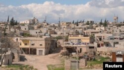 A general view shows Khan al-Assal area near the northern city of Aleppo, near the site where forces loyal to Syria's President Bashar al-Assad say a chemical weapons attack occurred, March 23, 2013.