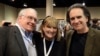 FILE - The children of Berkshire Hathaway Chairman and CEO Warren Buffett, from left, Howard Buffett, Susie Buffett, and Peter Buffett, pose for a photo at the CenturyLink Center exhibit hall in Omaha, Neb., May 1, 2015.