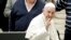 Pope Francis arrives for his weekly general audience, in the Pope Paul VI hall, at the Vatican, Dec. 5, 2018. 