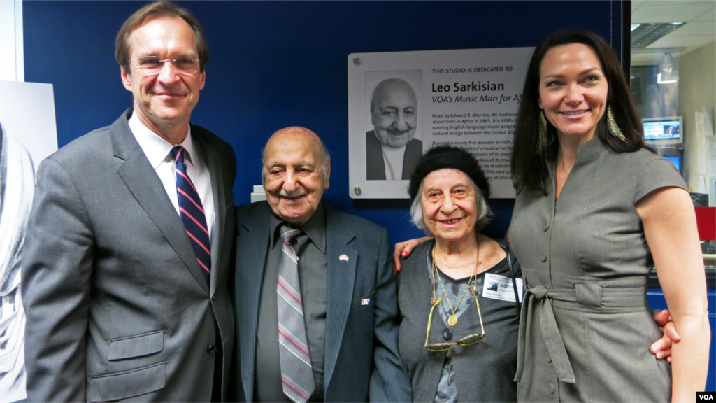 From left to right: VOA Director David Ensor, Leo Sarkisian, Mary Sarkisian, and Heather Maxwell (current host of Music Time in Africa) in front of the new plaque that honors Leo.