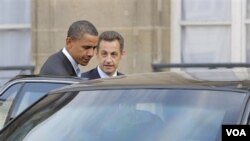 Prezidan Barack Obama ak Prezidan fransè a Nicolas Sarkozy nan Somè G20 an (foto achiv)