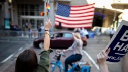 La lourde tâche de réconcilier les Américains