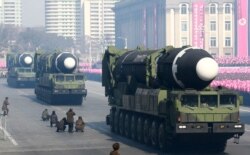 FILE - This photo taken Feb. 8, 2018, and released Feb. 9, 2018, by North Korea's official Korean Central News Agency shows Hwasong-15 ballistic missile during the military parade in Pyongyang, North Korea.