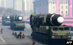 FILE - This photo taken Feb. 8, 2018, and released on Feb. 9, 2018, by North Korea's official Korean Central News Agency (KCNA) shows Hwasong-15 ballistic missile during the military parade in Pyongyang, North Korea.
