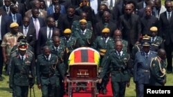 he body of Zimbabwe's founder and longtime ruler Robert Mugabe is brought to the national sports stadium for a state funeral in Harare, Zimbabwe, September 14, 2019. REUTERS/Siphiwe Sibeko - RC18764A61D0