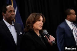 FILE - U.S. Vice President Kamala Harris speaks next to State Senator Darrell Jackson in Columbia South Carolina, on January 15, 2024.