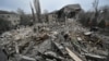 Rescuers work at the site of a maternity ward of a hospital destroyed by a Russian missile attack, as their attack on Ukraine continues, in Vilniansk, Zaporizhzhia region, Ukraine, Nov. 23, 2022. 