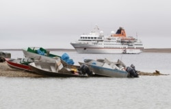 The MS Hanseatic cruise ship is seen in the Arctic community of Cambridge Bay, Canada, on Aug. 23, 2012.