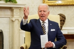 President Joe Biden gestures during a meeting with Israel's President Reuven Rivlin at the White House in Washington, June 28, 2021.