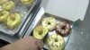 Halo Doughnut is one of tens of thousands of microbusinesses that have started in Malaysia during the past few months. (Dave Grunebaum/VOA)