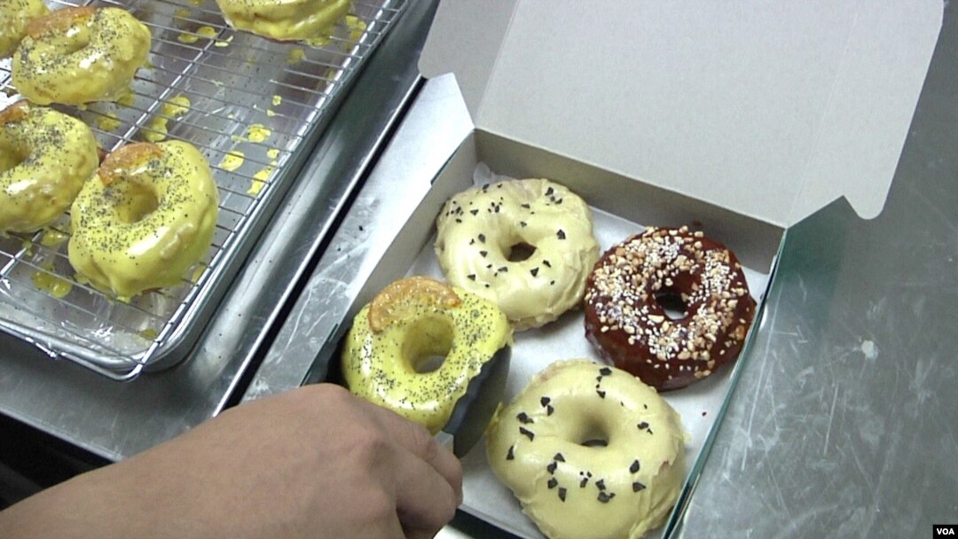 Halo Doughnut is one of tens of thousands of microbusinesses that have started in Malaysia during the past few months. (Dave Grunebaum/VOA)