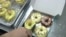 Halo Doughnut is one of tens of thousands of microbusinesses that have started in Malaysia during the past few months. (Dave Grunebaum/VOA)