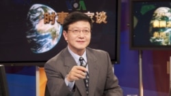 VOA Chinese TV Anchor Xu Bo hosting TV Talk Show Issues & Opinions.
