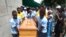 FILE: Soccer teammates of Kelvin Tinashe Choto carry his coffin, during his funeral in Chitungwiza, about 30 kilometres south east of the capital, Harare, Zimbabwe, Saturday, Jan, 19, 2019. He was shot dead by security forces.