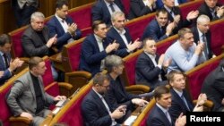 Ukrajinski parlament pozdravlja rezoluciju kojom je Rusija proglašena za državnog agresora, Kijev 27. januar 2015. 