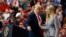 FILE - President Donald Trump greets his daughter Ivanka Trump as she arrives to speak during a rally in Cleveland, Nov. 5, 2018