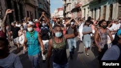 People shout slogans against the government during a protest in Havana, Cuba July 11, 2021. 