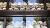 Skulls of victims from the Khmer Rouge period are kept at Choeung Ek killing fields in Phnom Penh, Cambodia. (Sun Narin/VOA Khmer) 