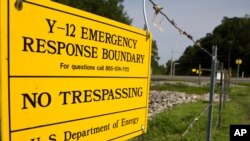 In this Aug. 17, 2012, photo a sign warns against trespassing onto the Y-12 National Security Complex in Oak Ridge, Tenn. 