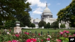 FILE - A photo shows the exterior view of the Capitol building in Washington. The House on Friday approved a bipartisan bill that would allow families of 9/11 victims to sue the government of Saudi Arabia.