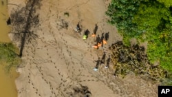 Potraga za nestalima u Severnoj Karolini (Foto: AP/Mike Stewart)