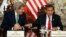 Peru's President Ollanta Humala, right, jokes with U.S. Secretary of State John Kerry — in Lima for a conference on climate change — as they talk to reporters following a private meeting in the Peruvian capital, Dec. 11, 2014.
