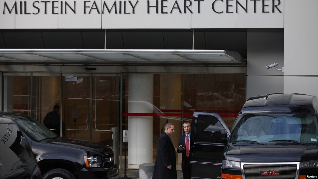 Members of the Secret Service stand outside New York-Presbyterian Hospital where U.S. Secretary of State Hillary Clinton remains hospitalized, January 1, 2013. 