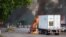 A truck burns in a street of Culiacan, Sinaloa state, Mexico, Oct. 17, 2019.