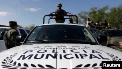 Soldados de diversas fuerzas militares en México fueron destinados a Tamaulipas en diciembre de 2011 ante la ola de violencia desatada entre los cárteles de El Golfo y Los Zetas.