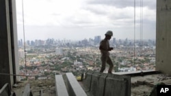 A worker walks at an apartment construction site in Jakarta, Indonesia (file photo)
