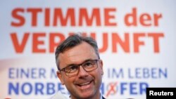 Presidential candidate Norbert Hofer presents his new electoral posters during a news conference in Vienna, Austria, April 29, 2016. 