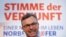 Presidential candidate Norbert Hofer presents his new electoral posters during a news conference in Vienna, Austria, April 29, 2016. 