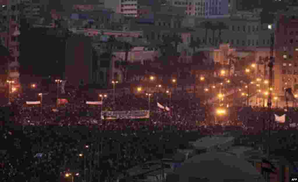 A crowd remains late afternoon in Tahrir, or Liberation, Square in Cairo, Egypt, Tuesday, Feb. 1, 2011. More than a quarter-million people flooded into the heart of Cairo Tuesday, filling the city's main square in by far the largest demonstration in a wee