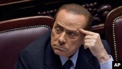 ນາຍົກລັດຖະມົນຕີ Silvio Berlusconi ແຫ່ງອີຕາລີ.
ວັນທີ 9 ພະຈິກ 2011.