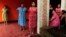 Pregnant teenagers stand at the entrance of a maternity home in Jinotega city, north of Managua, Nicaragua. Oct. 24, 2013. 